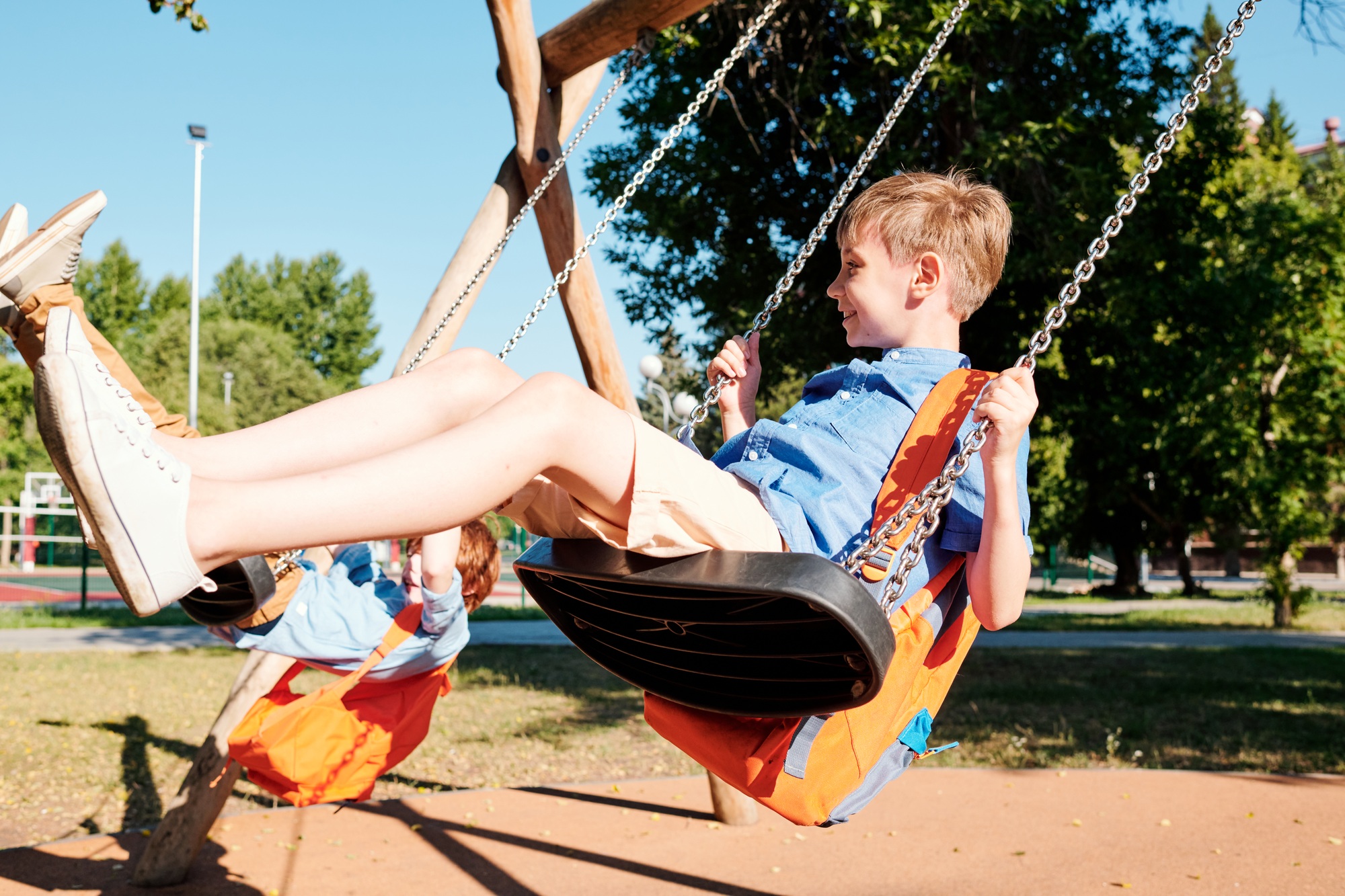 Kids swinging on swings